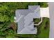 Bird's eye view of home's roof and landscaping at 5249 Far Oak Cir, Sarasota, FL 34238