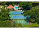 Aerial view of community amenities including pool, tennis, and basketball court at 5249 Far Oak Cir, Sarasota, FL 34238