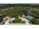 Aerial view of community amenities including pool, tennis, and clubhouse at 5249 Far Oak Cir, Sarasota, FL 34238