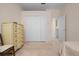 Bedroom with a large closet and access to a bathroom at 5249 Far Oak Cir, Sarasota, FL 34238
