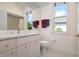 Clean bathroom with a toilet, vanity, and shower/tub combo at 5249 Far Oak Cir, Sarasota, FL 34238