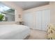 Bright bedroom with double closets and large window at 5249 Far Oak Cir, Sarasota, FL 34238
