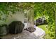 Relaxing patio with covered pergola and grill at 5249 Far Oak Cir, Sarasota, FL 34238