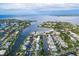 Panoramic aerial view of a waterfront community with numerous canals and gorgeous waterfront homes at 508 65Th St, Holmes Beach, FL 34217