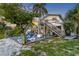 Spacious backyard features outdoor seating, a grill, and views of the serene canal at 508 65Th St, Holmes Beach, FL 34217