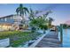 Picturesque backyard with a private dock and ample space for outdoor activities at 508 65Th St, Holmes Beach, FL 34217