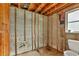 Partially renovated bathroom with exposed beams and toilet at 508 65Th St, Holmes Beach, FL 34217