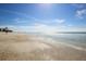Beautiful beach with soft sand and clear blue water, inviting for a relaxing day at 508 65Th St, Holmes Beach, FL 34217