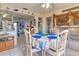 Dining area with a table set for four, with a view into the living area at 508 65Th St, Holmes Beach, FL 34217