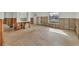 Interior view of a home showing signs of damage, with exposed framing and concrete floors at 508 65Th St, Holmes Beach, FL 34217