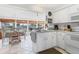 Sunlit eat-in kitchen area with serene waterfront views at 508 65Th St, Holmes Beach, FL 34217