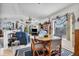 Open floor plan with dining and living areas, nautical decor, and plenty of natural light at 508 65Th St, Holmes Beach, FL 34217