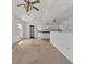Bright living room with open floor plan and views into the adjacent kitchen at 508 65Th St, Holmes Beach, FL 34217
