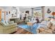 Cozy living room with comfortable seating, wood floors, and natural light at 508 65Th St, Holmes Beach, FL 34217