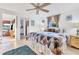 Spacious main bedroom featuring a large bed and adjoining bath at 508 65Th St, Holmes Beach, FL 34217