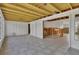 Spacious room with tile floors and exposed ceiling beams at 508 65Th St, Holmes Beach, FL 34217