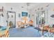 Relaxing sunroom features comfortable seating, bright lighting, and views of the outdoors at 508 65Th St, Holmes Beach, FL 34217