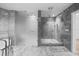 Modern bathroom with a large walk-in shower and marble tile at 2912 W Santiago St # 2004, Tampa, FL 33629