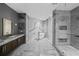 Luxurious bathroom with marble accents and a freestanding tub at 2912 W Santiago St # 2004, Tampa, FL 33629