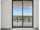 Bedroom with sliding glass doors revealing a stunning view at 2912 W Santiago St # 2004, Tampa, FL 33629