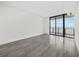 Bright bedroom with floor to ceiling windows and water views at 2912 W Santiago St # 2004, Tampa, FL 33629