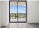 Stunning panoramic city view visible through sliding glass doors at 2912 W Santiago St # 2004, Tampa, FL 33629