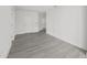 Modern hallway with gray tile floors and an open floor plan at 2912 W Santiago St # 2004, Tampa, FL 33629