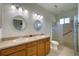Double vanity bathroom with walk-in shower at 4271 Cascade Falls Dr, Sarasota, FL 34243