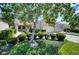 Villa with two-car garage and mature landscaping at 4271 Cascade Falls Dr, Sarasota, FL 34243