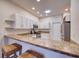 Kitchen with granite countertops and breakfast bar at 4271 Cascade Falls Dr, Sarasota, FL 34243