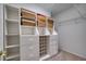 Large walk-in closet with shelving and drawers at 4271 Cascade Falls Dr, Sarasota, FL 34243