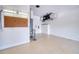 Garage with water heater, AC unit and pegboard at 4271 Cascade Falls Dr, Sarasota, FL 34243