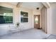 Covered front porch with French doors at 4271 Cascade Falls Dr, Sarasota, FL 34243