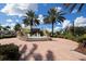 Circular fountain in a community plaza with benches and palm trees at 14215 Kinglet Ter, Lakewood Ranch, FL 34202