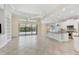 Modern kitchen with white cabinetry and granite countertops at 14215 Kinglet Ter, Lakewood Ranch, FL 34202