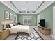 Spacious bedroom with wood floors, plantation shutters, and ceiling fan at 14215 Kinglet Ter, Lakewood Ranch, FL 34202