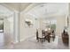 Formal dining room featuring a wood table and chandelier at 14215 Kinglet Ter, Lakewood Ranch, FL 34202