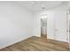 Bright bedroom with hardwood floors and a spacious walk-in closet at 14215 Kinglet Ter, Lakewood Ranch, FL 34202