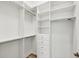 Large walk-in closet with ample shelving and hanging space at 14215 Kinglet Ter, Lakewood Ranch, FL 34202