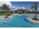 Community pool with expansive deck and landscaping at 14215 Kinglet Ter, Lakewood Ranch, FL 34202