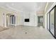 Open living area with a view of the backyard and a separate room at 14215 Kinglet Ter, Lakewood Ranch, FL 34202