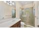 Clean bathroom with single vanity and shower at 14215 Kinglet Ter, Lakewood Ranch, FL 34202
