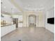 Open kitchen with center island, stainless steel appliances and a view to the living room at 14215 Kinglet Ter, Lakewood Ranch, FL 34202