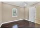 Spacious bedroom with hardwood floors and plantation shutters at 14215 Kinglet Ter, Lakewood Ranch, FL 34202