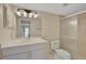 Clean bathroom with a shower/tub combo, vanity, and toilet at 684 Bird Bay W Dr # 132, Venice, FL 34285