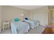 Guest bedroom with twin beds and built-in closet at 684 Bird Bay W Dr # 132, Venice, FL 34285