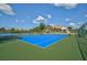 Two well-maintained tennis courts with green and blue surfaces at 684 Bird Bay W Dr # 132, Venice, FL 34285