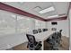 Bright meeting room with a long table and comfortable chairs at 684 Bird Bay W Dr # 132, Venice, FL 34285