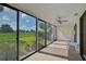 Bright enclosed patio with view of the golf course at 684 Bird Bay W Dr # 132, Venice, FL 34285