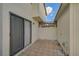 Private patio with adjacent storage shed at 684 Bird Bay W Dr # 132, Venice, FL 34285